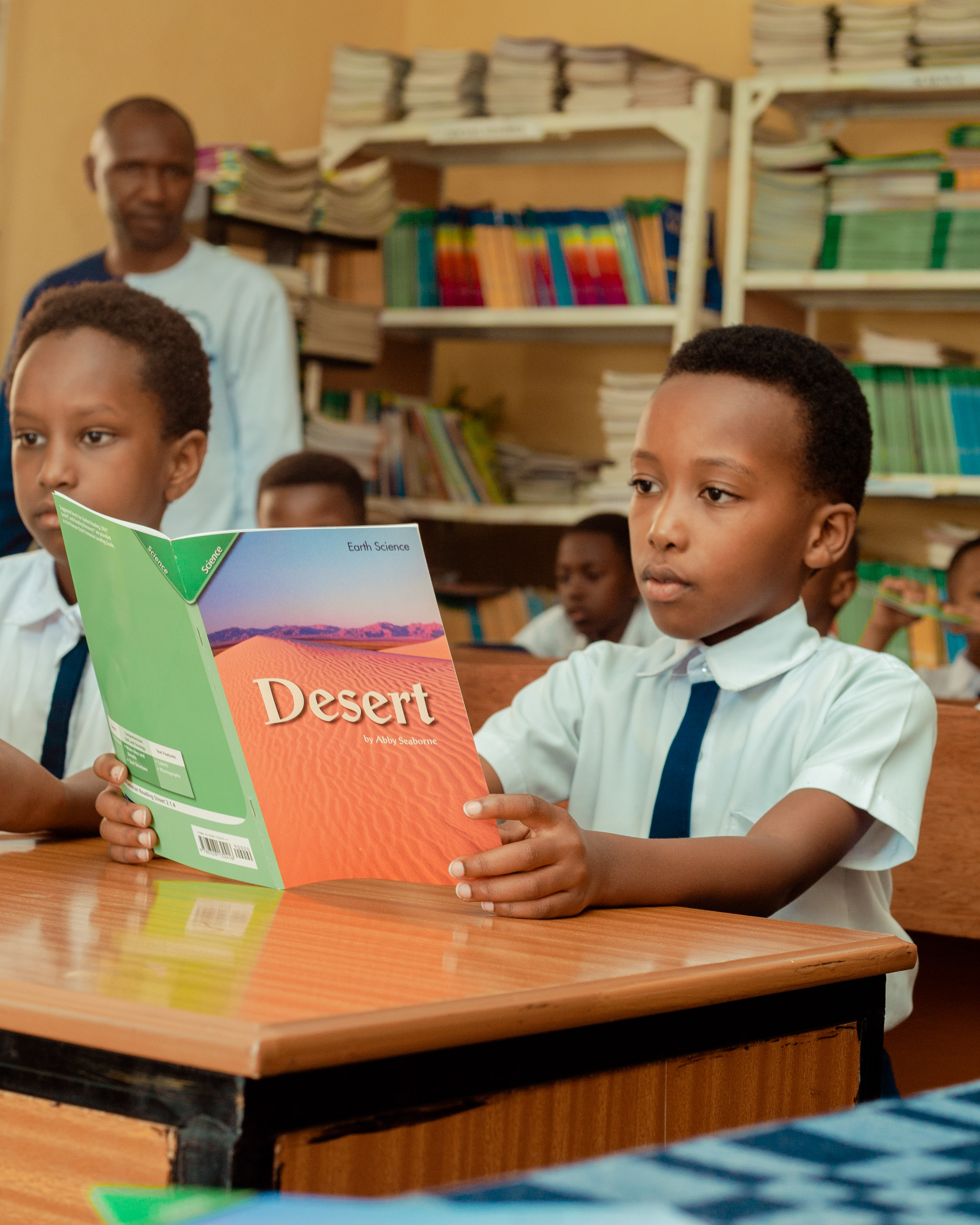 A BBFS pupil reading in the school library