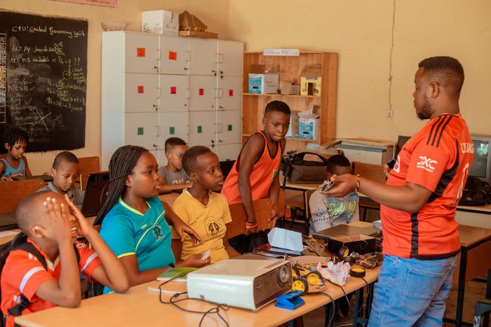 A learner working on a robotics project